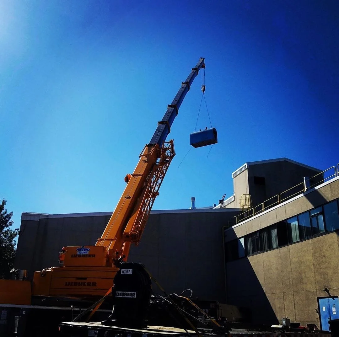Was a beautiful weekend for rigging out old 10,000 lb boilers, to be replaced by three 6,000 MBTU high-efficiency condensing #boilers at a manufacturing plant. #boilerplantupgrade #condensingboilersystems