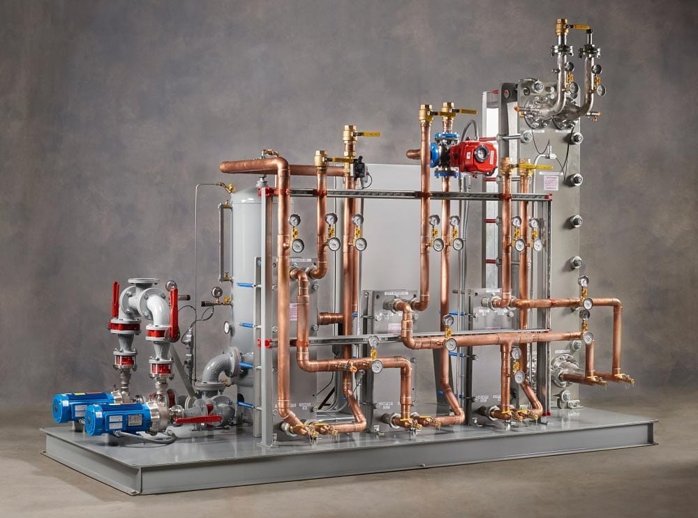 Heat recovery from three 125 HP oil free air compressors and heat of compression air dryers, used for preheating boiler feed water and CIP process.