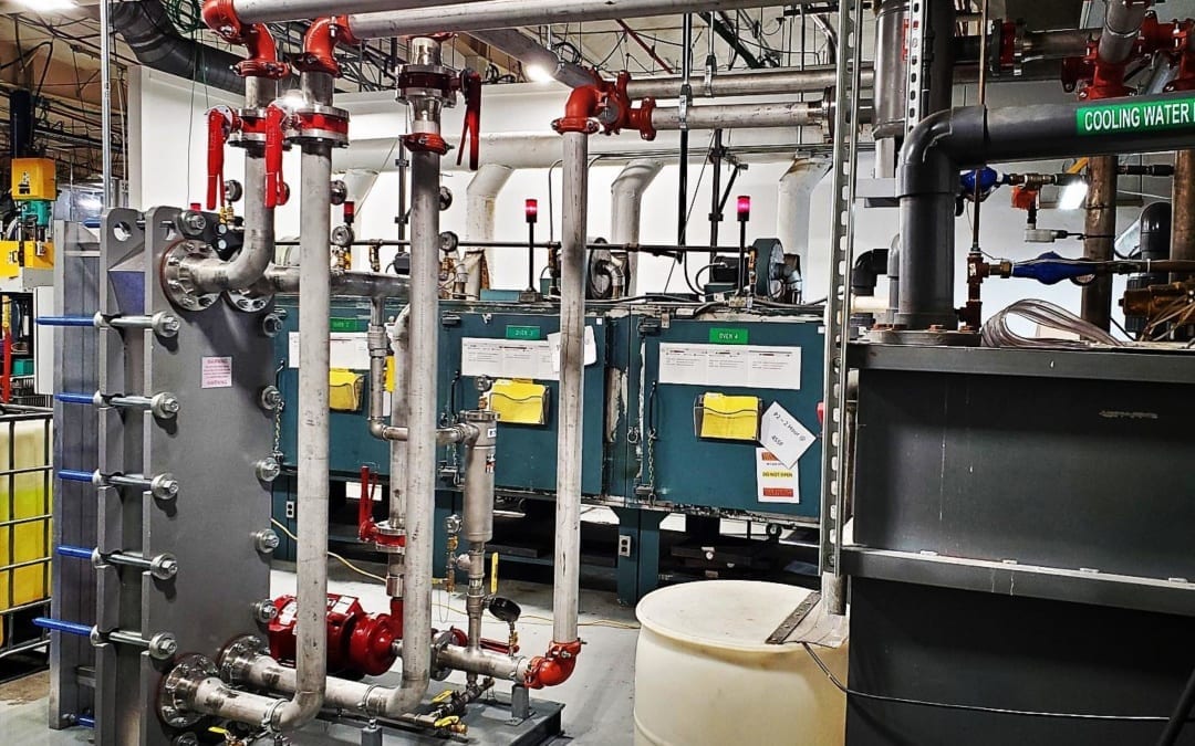 Recently-installed heat exchanger skid to convert open process cooling system to a closed loop. This eliminates fouling in Freudenberg’s molding machines, increasing the cooling effect, increasing production output, and reducing maintenance costs. #ConvertOpenCoolingTowertoClosedSystem #EliminateCoolingTowerFouling #CleanUpOpenCoolingTower #ProcessCooling