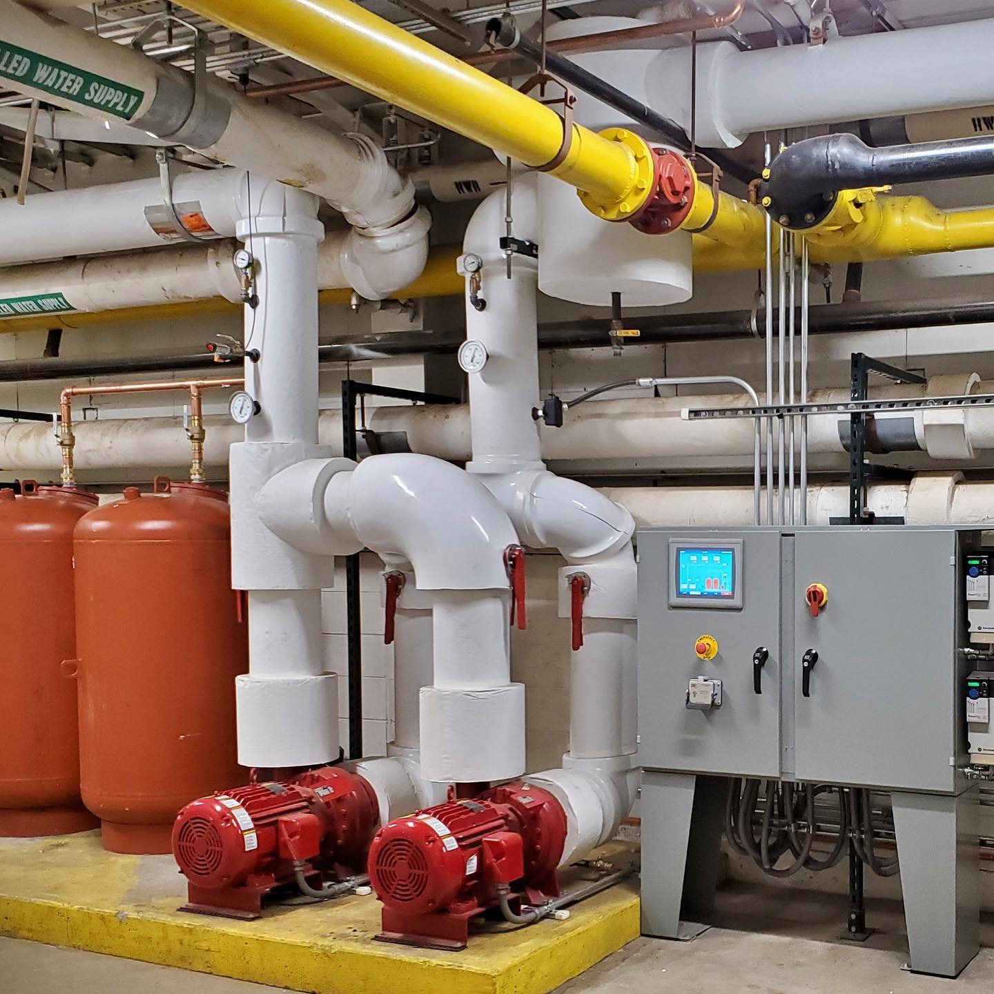 Recent design-build project for a Fortune 500 chemical manufacturer. We replaced an existing boiler and pump system with high efficiency 6,000 BTU condensing hot water boilers (18,000 BTU total) saving the customer 52,000+ Therms per year amounting to $52,325 saved per year.We redesigned and repiped the system, eliminating 3 pumps and saving an additional 16,000+ KWH. The customer also received a $75,000 utility rebate from the power company.